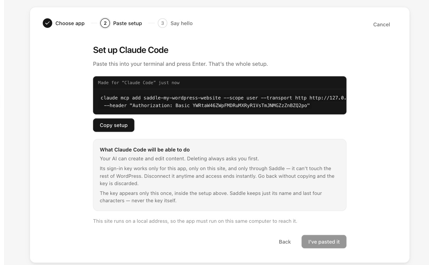 Saddle setup step for Claude Code showing the one-line terminal command with the WordPress MCP server address and sign-in key