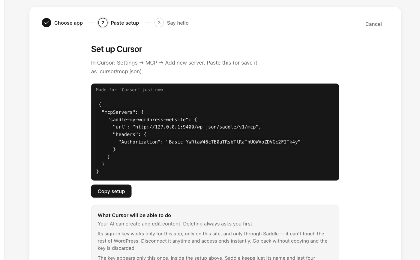 Saddle setup step for Cursor showing the mcp.json configuration with the WordPress MCP server URL and Authorization header