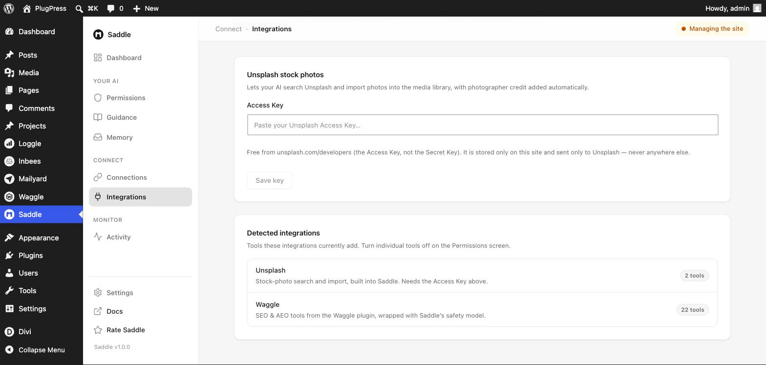 Saddle Integrations screen showing the Unsplash Access Key field and detected integrations for Unsplash and Waggle